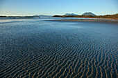 Ripples Form In The Sand At Chesterman's Beach And Frank Island Near Tofino; British Columbia Canada