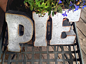 Sign at Pie Shop Entrance