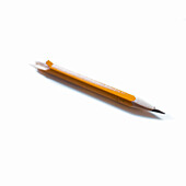 Broken pencil on white background