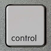 Computer key with the word 'control'