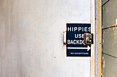Sign on Door "Hippies Use Backdoor", Haight-Ashbury, San Francisco, California, USA