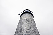 Low Angle View of Lighthouse against Foggy Sky