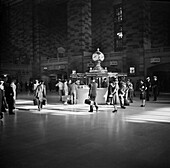 Group of People gathered around Information Booth, Main Concourse, Grand Central Terminal, New York City, New York, USA, John Collier, Jr., U.S. Office of War Information/U.S. Farm Security Administration, October 1941