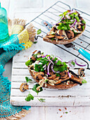 Vegan mushroom and herb salad on crunchy bread