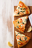 Pizza wedges with shrimp and cheese