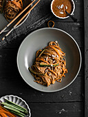 Soba noodles in spicy peanut sauce
