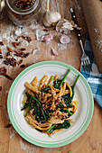 Homemade Casarecce pasta with vegetables and sausage