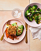 Quinoa-crusted salmon with broccoli steaks