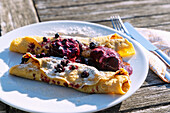 Czech pancakes with blueberries and blueberry ice cream