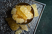 Iranian crystal rock candy in vintage metal bowl