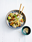 Fried chicory with tempeh and rice noodles