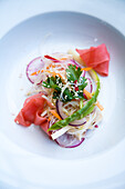Asian glass noodle salad with radish, pickled ginger, green asparagus, and sesame seeds