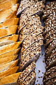 Baguette, whole grain bread and sunflower seed bread