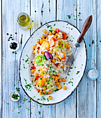 Rice with chickpeas and colorful carrots