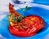 Chicken thighs with red pepper sauce