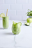 Green smoothie with cucumber, avocado and banana