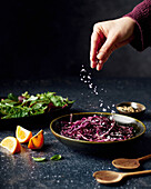 Salting red cabbage for raw vegetable salad