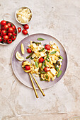 Pasta with roasted asparagus, tomatoes, lemon and parmesan cheese