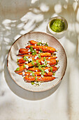 Roasted carrots with carrot green pesto and goat cheese