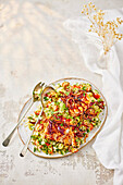 Harissa fish on bulgur salad