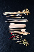 Assorted wooden skewers and wooden picks
