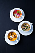 Pumpkin soup with bread, gazpacho and mushroom soup