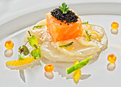 Sea bream and salmon with caviar and vegetables