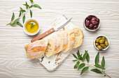 Ciabatta with olive oil, green and black olives