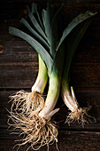 Leeks on a wooden surface