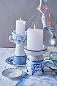 Blue and white tableware as candlesticks