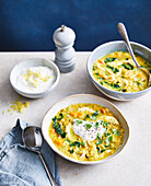 Spiced red lentil and chicken soup with greens