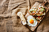 Crab bread with horseradish and fried egg
