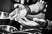 Hands with leftover dough