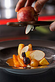 Braised mixed fruit with thinly shaved apple slices
