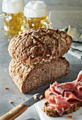 Homemade walnut bread with ham and beer