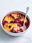 Lemon curd raspberry bread and butter pudding