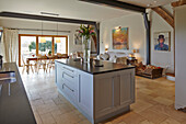 Center island in kitchen area in a converted barn