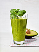 Pear and romaine drink with avocado. Celery and mint