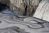 Iceland. Ice designs and Dettifoss, Jokulsa a Fjollum River, Vatnajokull National Park.