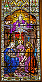 Young Jesus, Mary, Joseph and God the Father stained glass Gesu Church, Miami, Florida. Built 1920's Glass by Franz Mayer.