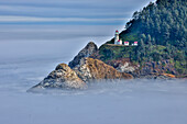 Usa, Oregon, Florence. Heceta Head Lighthouse, A Foggy Morning on the Pacific Surrounding the Heceta Head Lighthouse