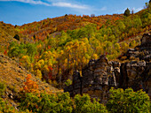 USA, Utah, Highway 89 and canyon walls of Logan pass with fall colors