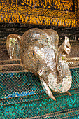 Laos, Luang Prabang. Mosaic elephant head.