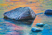 Canada, Quebec, Parc National du Fjord-du-Saguenay. Rock and reflections in Saguenay River.