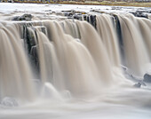 Waterfall Selfoss in the Vatnajokull National Park. Selfoss is the first of several waterfalls of river Jokulsa a Fjollum in the canyon Jokulsargljufur, Iceland