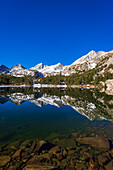 Sierra peaks reflected in Long Lake, Little Lakes Valley, John Muir Wilderness, California, USA