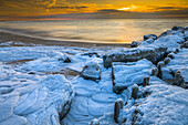 USA, New Jersey, Cape May National Seashore. Ice and snow on ocean shore.