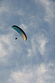 A Paraglider Making The Final Descent Over Oludeniz At The Turquoise Coast, Southern Turkey