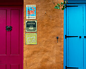 United Kingdom, England, Cornwall, Colorful shop front doors and signs; Falmouth