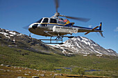 Sweden, Helicopter transfer for fly fishing trip to Stora Sjofallet National Park; Lappland
